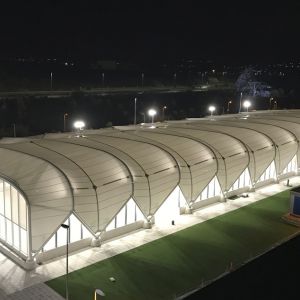 Exterior image of the canvas stretched at night